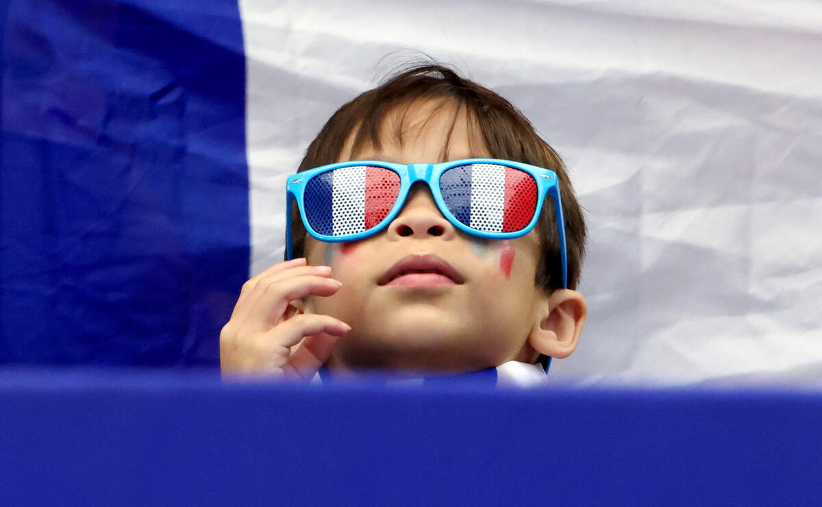 A young France fan at Dallas Stadium for the 2026 FIFA World Cup semifinal between France and Spain on Tuesday, July 14, 2026, in Arlington.