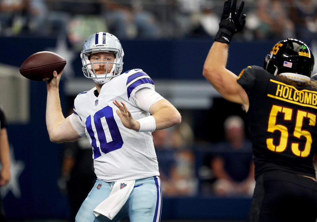 Dallas Cowboys Cooper Rush throws the ball during the second half against the Washington Commanders on Sunday, Oct. 2, 2022, at AT&T Stadium in Arlington.