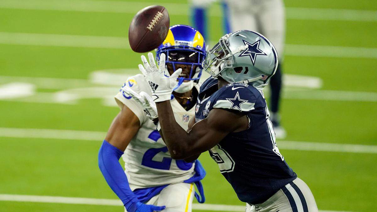 With less than a minute to play, Dallas Cowboys wide receiver Michael Gallup, right, makes a catch but is called for offensive pass interference. That essentially sealed the Los Angeles Rams’ 20-17 victory. (AP Photo/Ashley Landis)