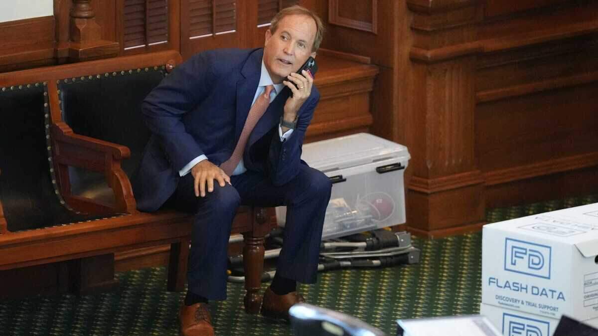 Ken Paxton arrives on the Senate floor for his impeachment trial Tuesday, Sept. 5, 2023, at the Capitol in Austin. The trial will determine if the suspended Attorney General will be removed from office.