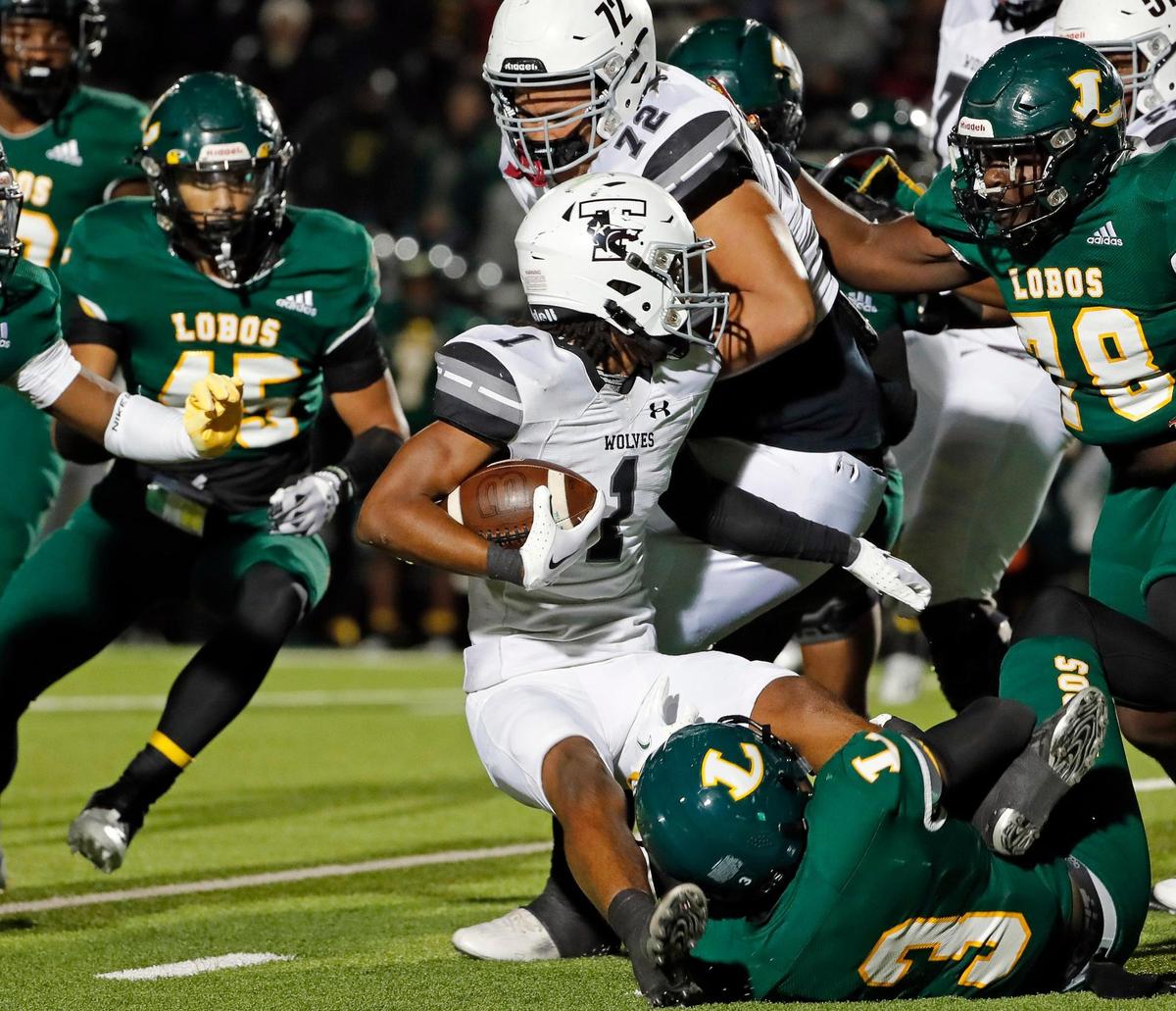 Timberview running back Jarvis Reed (1) is brought down after a three yard gain in the first half of a UIL Class 5A D1 Region 2 final football game at Mesquite Memorial in Mesquite, Texas, Friday, Dec. 02, 2022. The score was knotted14 at the half. (Special to the Star-Telegram Bob Booth)