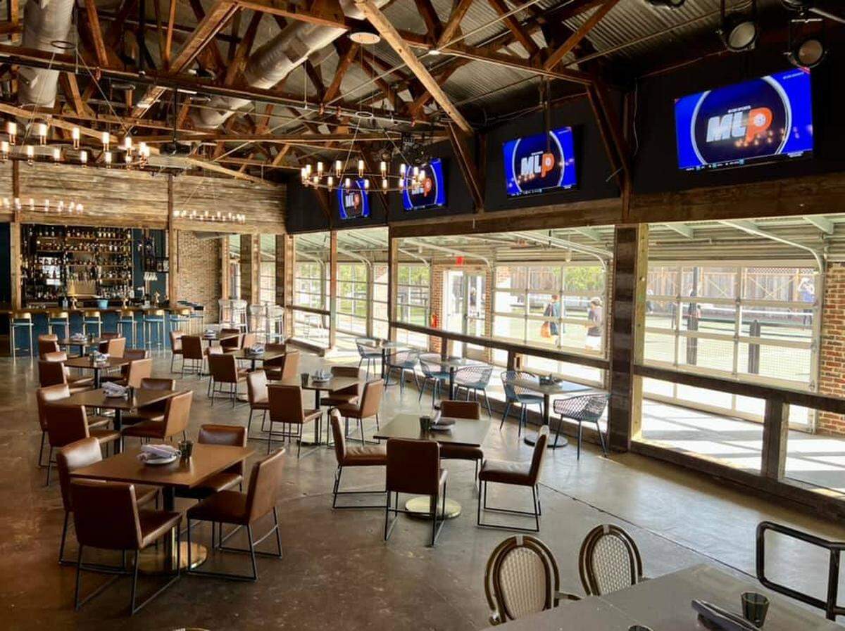Courtside Kitchen pairs a full restaurant menu with pickleball courts.