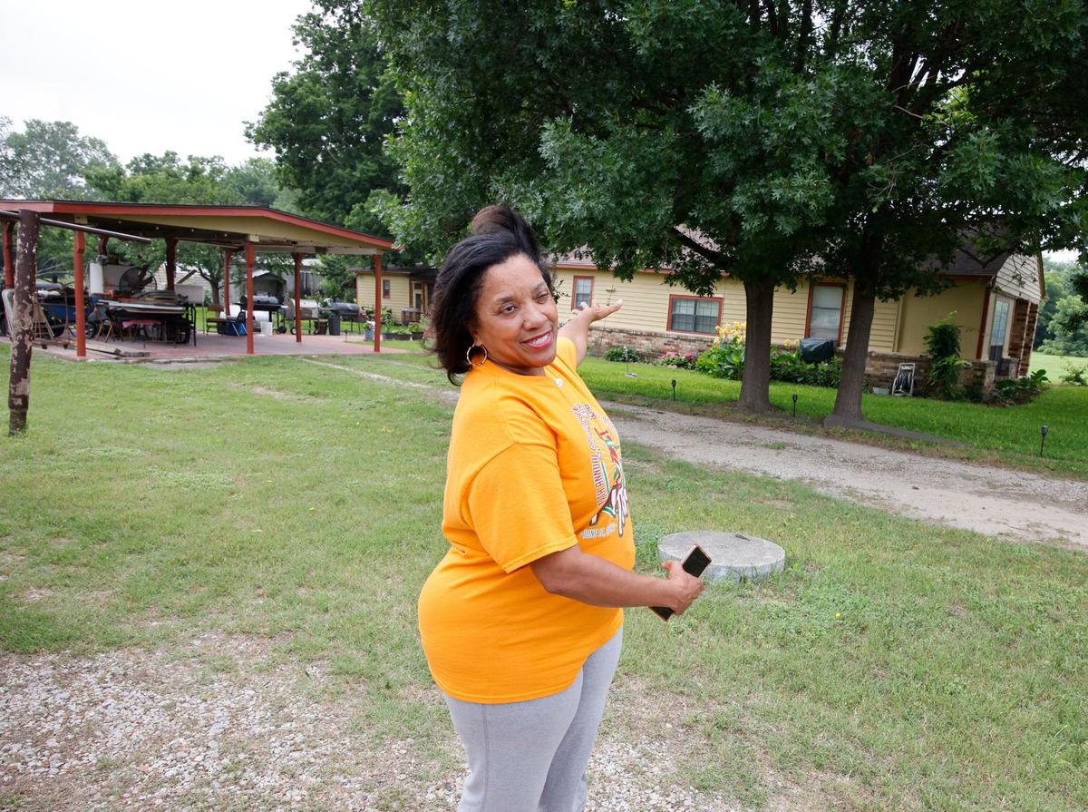 Trina Sanders talks about her grand parents house that is now occupied by her uncle Delbert Sanders Sr. in Fort Worth, Texas, Friday May 24, 2024.