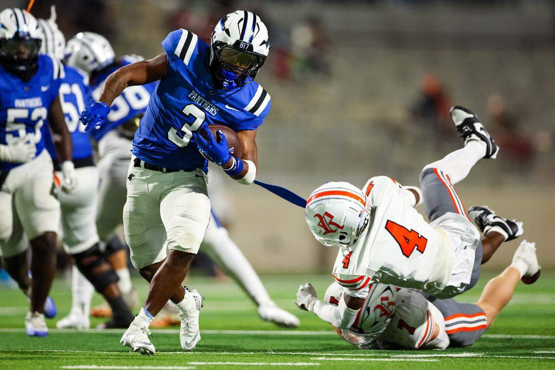 North Crowley running back G'Yrell Smith runs past two Rockwall defenders into open space in a non-district game between North Crowley and Rockwall at Crowley ISD Stadium in Crowley, Texas on Sept. 18, 2025.
