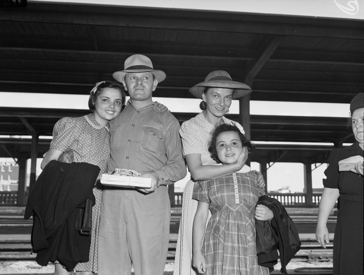 From left, Elsa Kokotek, 13, her Uncle Sol Englender, Aunt Ruth Englender, and her little sister Inga Kokotek, 9, after the met at the T&P Station on Sept. 8, 1941.