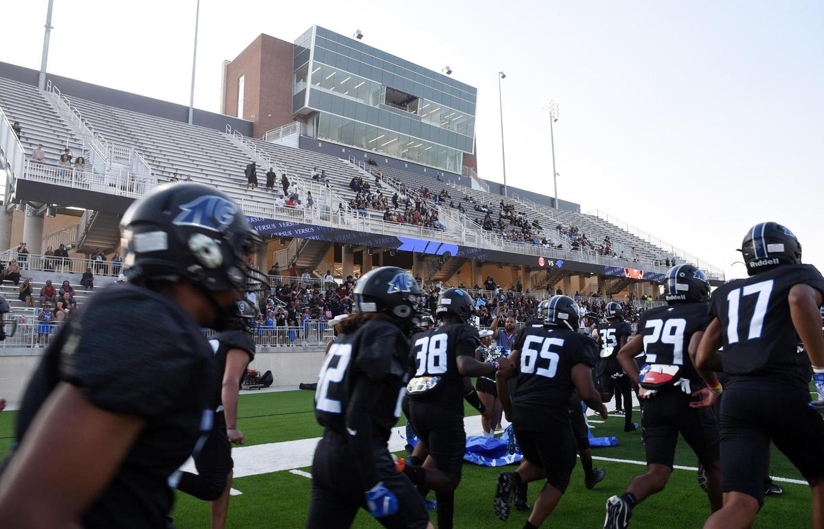 The North Crowley football team runs onto the field to play their first football game in a new stadium against Lovejoy Thursday September 8, 2022 at Crowley ISD Stadium in Fort Worth, Texas. Special/Bob Haynes