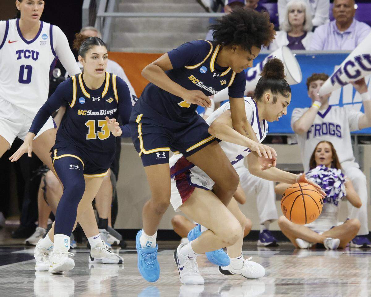 UC San Diego guard Makayla Rose (4) and TCU guard Veronica Sheffey (2) get tangled up during the second half of an NCAA Division I Women's Basketball Championship game at Schollmeier Arena in Fort Worth, Texas, Friday, March, 20, 2026.