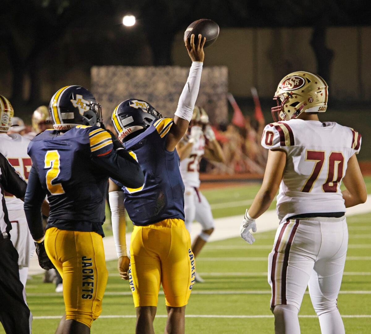 Arlington Heights linebacker Joe Johnson (9) shows his fumble recovery during a District 4-5A D1 football game at Farrington Field in Fort Worth, Texas, Thursday, Oct. 10, 2024. (Special to the Star-Telegram / Bob Booth)