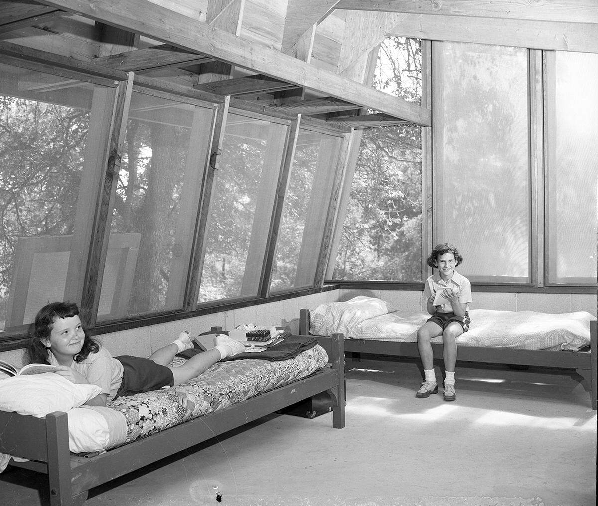 June 19, 1953: Two Brownies (Girl Scouts) Nelda Sue Johnson and Joy Jarvis. They are at Camp Timberlake on Eagle Mountain Lake.