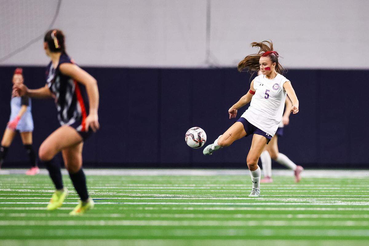 Grapevine midfielder Tatum Harig (5) passes the ball toward her teammates against Frisco Wakeland in a Class 5A Division II UIL girls soccer state semifinal at the Ford Center on April 3, 2026 in Frisco, Texas.