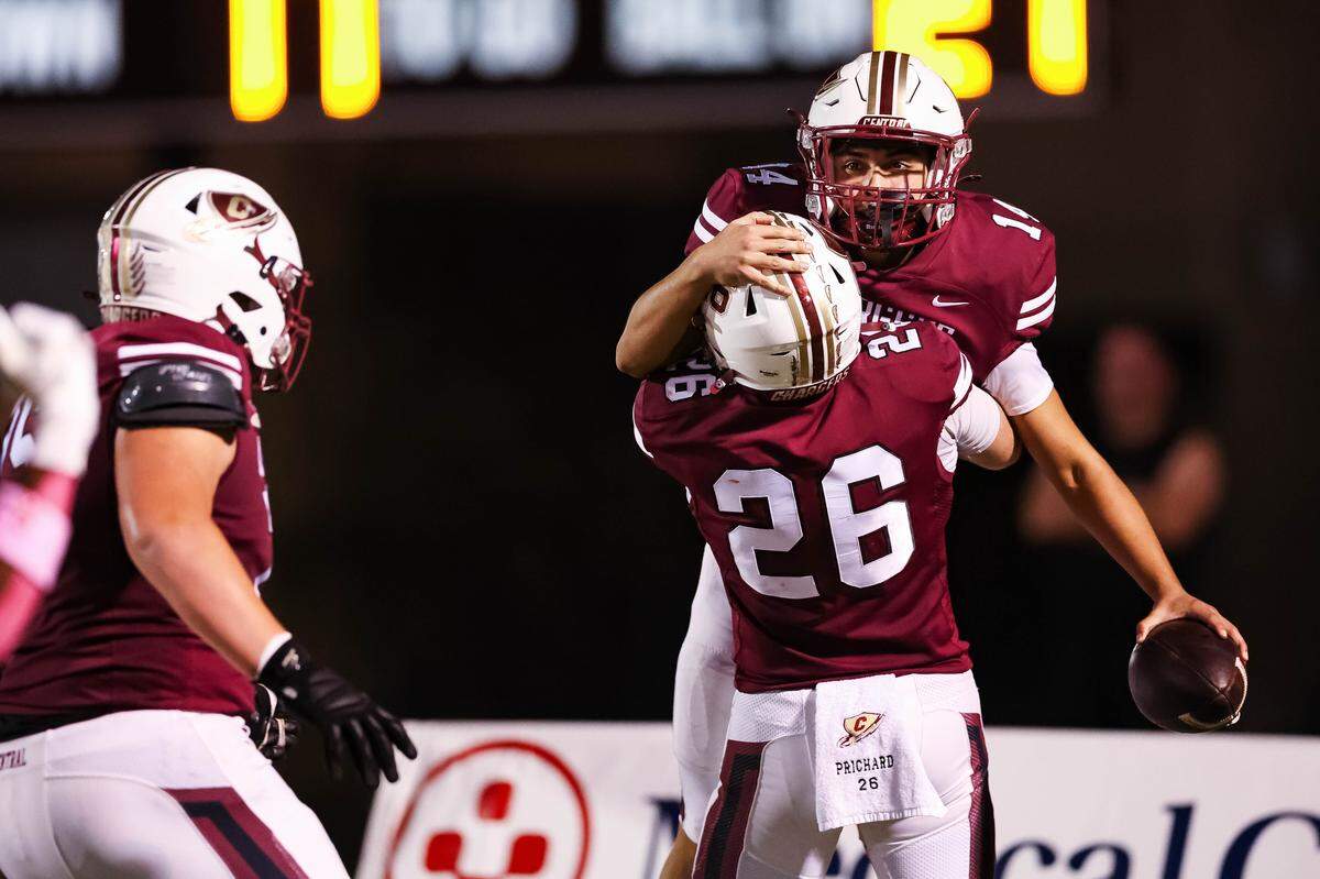 Keller Central wide receiver Edward Cole celebrates with his teammate after catching a pass on a fake field goal for a touchdown during a district game between Keller Central and L.D. Bell at Keller ISD Stadium in Keller, Texas on October 16, 2025.