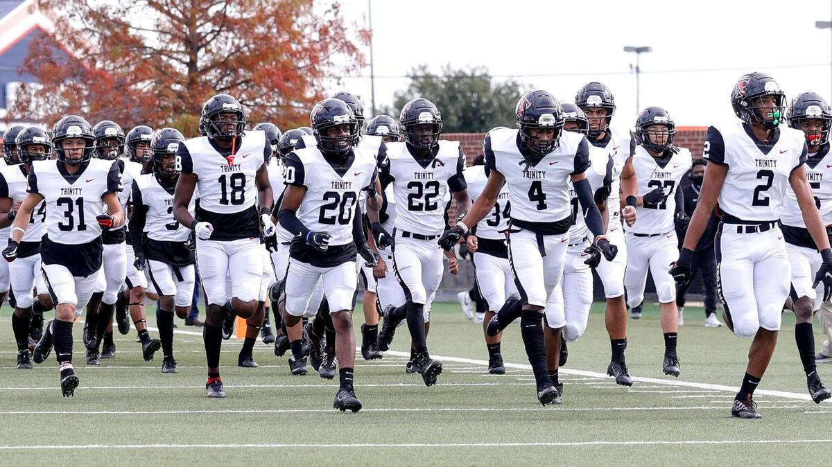 The Euless Trinity Trojans enter the field to face the Haltom Buffalos in a High School Football game played, Friday afternoon, November 27, 2020 at the Birdville ISD Fine Arts/Athletics Complex in North Richland Hills, Tx. (Steve Nurenberg Special to the Star-Telegram)