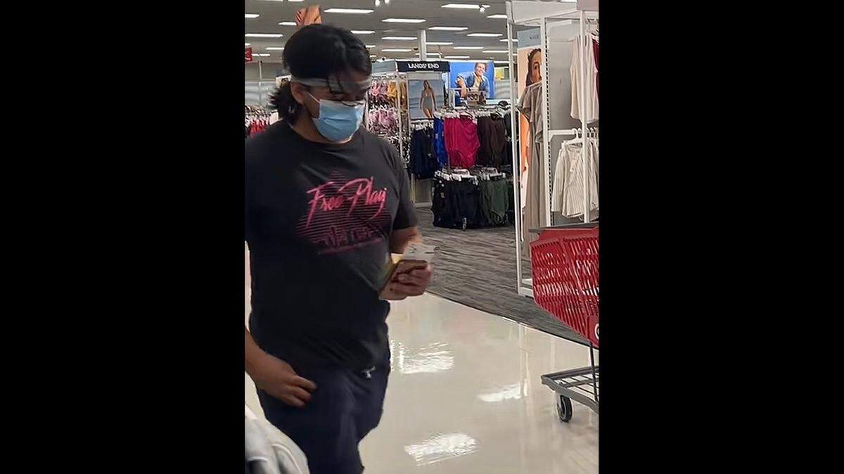 North Richland Hills police are asking for the public’s help identifying this man, who they say sprayed something on the back of a female Target shopper.