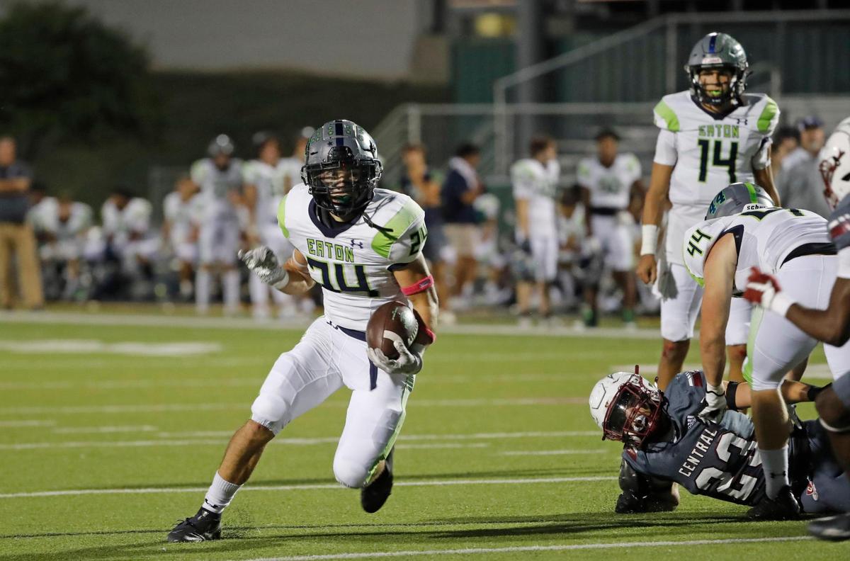 Eaton running back Logan Wright (24) rounds the right side for yardage during a District 4-6A high school football game at Keller ISD Stadium in Keller, Texas, Thursday, Oct. 06, 2022. Eaton led Keller Central 24-10 at the half. (Special to the Star-Telegram Bob Booth)