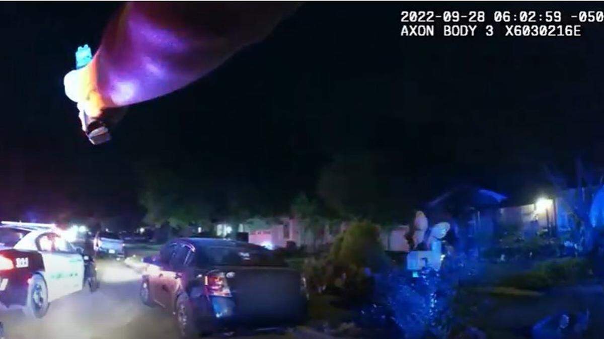 The Dallas Police Department on Thursday released body-camera footage of Wednesday’s incident in which officers fatally shot a man and said they found an unspecified number of loaded rifles on the porch of the house where the shooting took place.