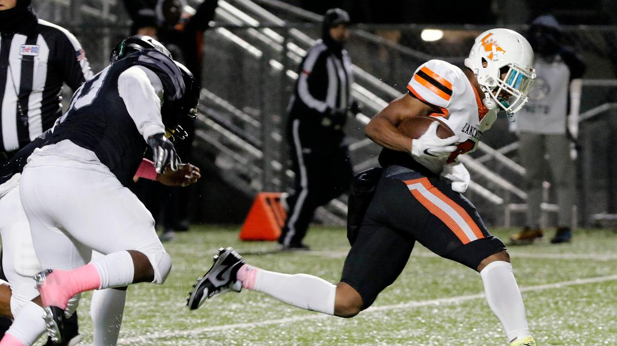 Lancaster running back Tre Bradford (2) breaks through for their second score during a high school football game at R. L. Anderson Stadium in Mansfield, Texas, Friday, Oct. 25, 2019. Lancaster led by 7 at the half. (Special to the Star-Telegram Bob Booth)