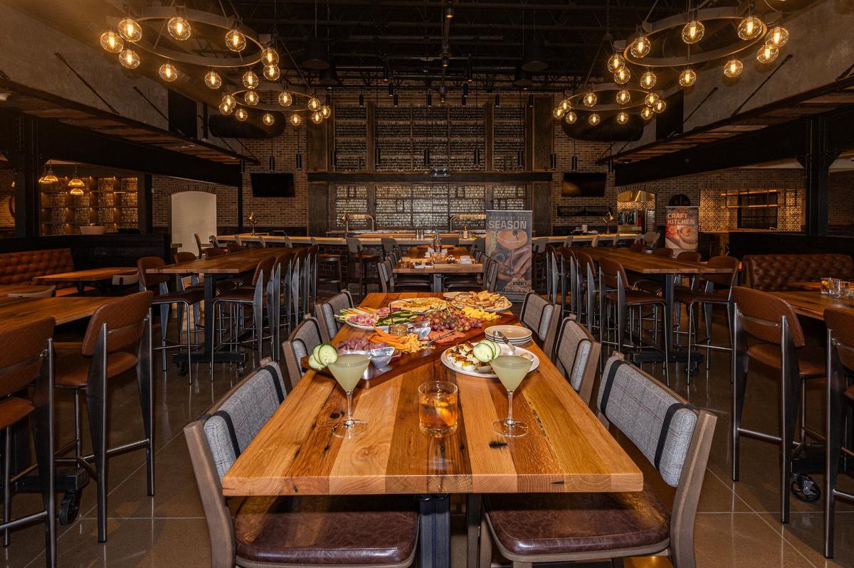 The main dining room with food selections and cocktails available at the new Whiskey Cake restaurant in Alliance.
