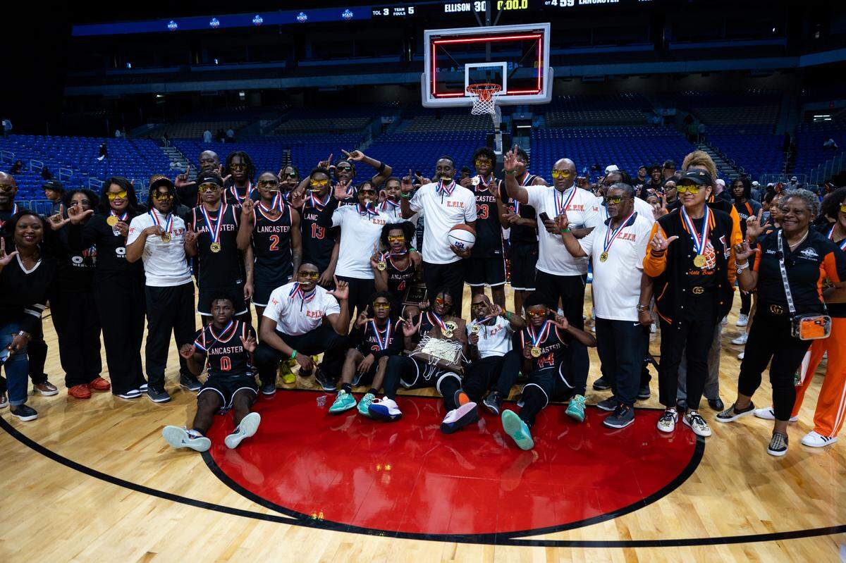 The Lancaster Tigers pose after winning in the Class 5A state championship game on Saturday, March 9, 2024 at the Alamodome in San Antonio, Texas. Lancaster defeated Ellison 59-30.