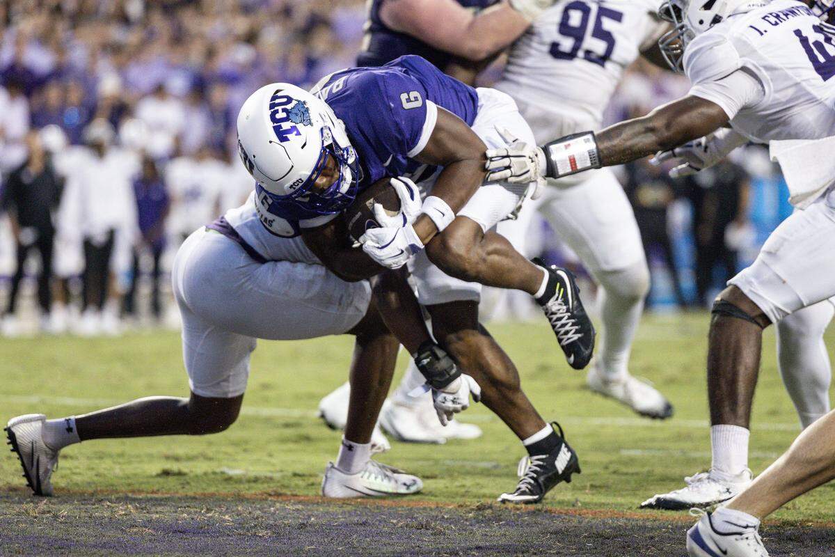 TCU running back Trent Battle (6) scores a touchdown in the first half of an NCAA game between TCU and Abilene Christian at Amon G. Carter Stadium in Fort Worth on Saturday, Sept. 13, 2025.