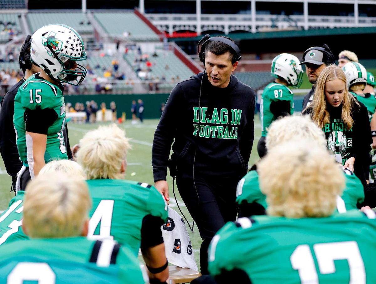 Southlake Carroll head coach Riley Dodge talks to the offense in the first half of Class 6A D2 regional semi-finals football game at Choctaw Stadium in Arlington, Texas, Friday, Nov. 25, 2022. Carroll tied the game at 7 with 28.6 seconds remaining in the half but McKinney stormed back in 21 seconds and made the game 14-7. (Special to the Star-Telegram Bob Booth)