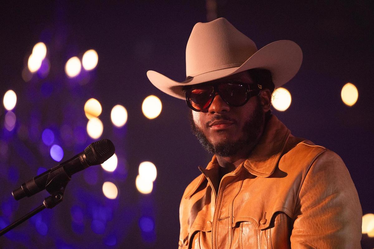 Leon Bridges, an award-winning musician from Fort Worth, shares words on stage at The Big Good’s annual fundraiser ‘The Big Night’ at the River Ranch Stockyards in Fort Worth on Thursday, April 3, 2025.
