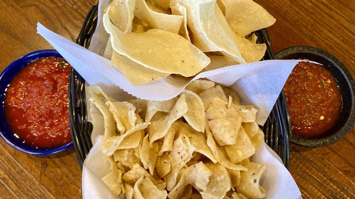 The new Mexican Inn Cafe in Mansfield offers both mild (left) and spicy salsa and both its original Fritos-style or traditional tortilla chips.