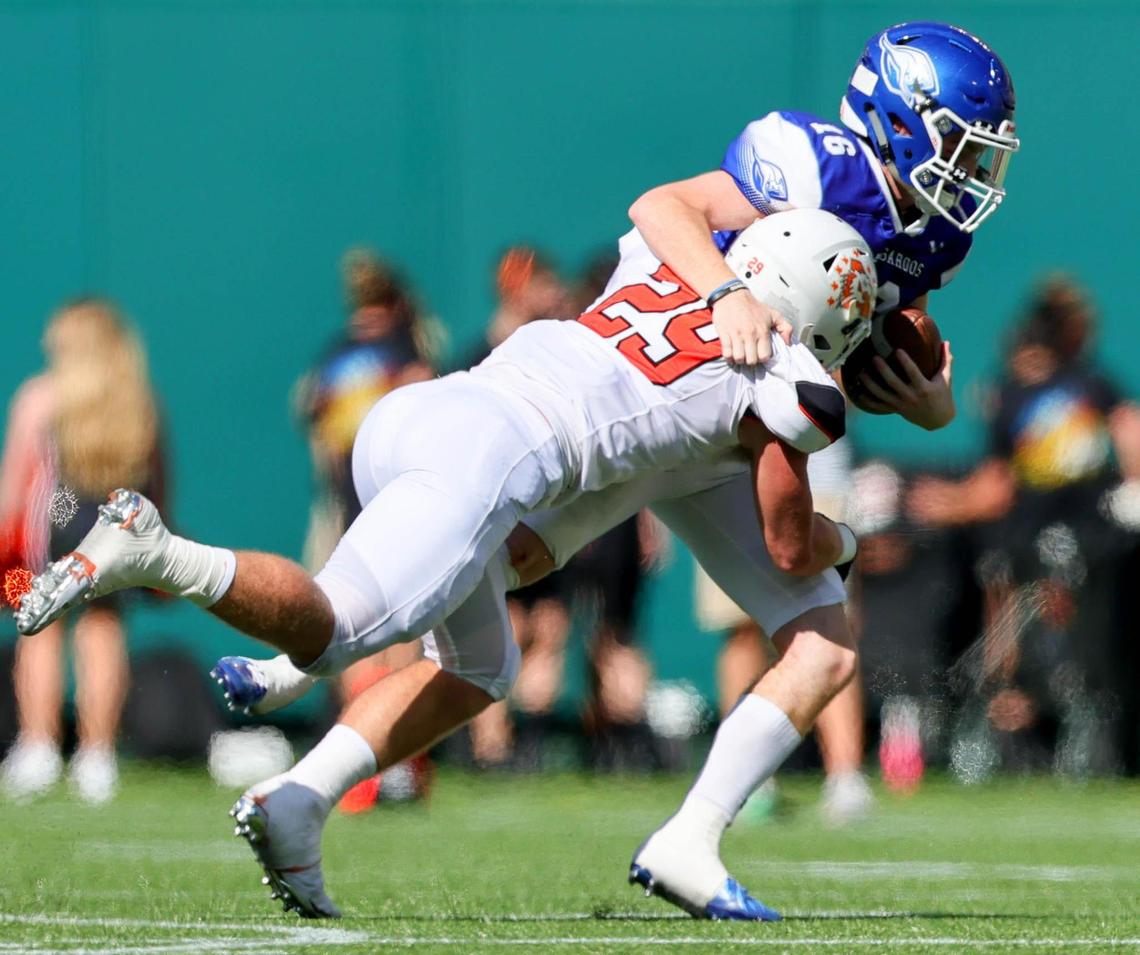 Aledo defensive end Caden Anderson (29) sacks Weatherford quarterback Major Youngblood (16) for a loss during the first half, Saturday afternoon, Sepember 26, 2020 played at Globe Life Park in Arlington, TX (Steve Nurenberg Special to the Star-Telegram)