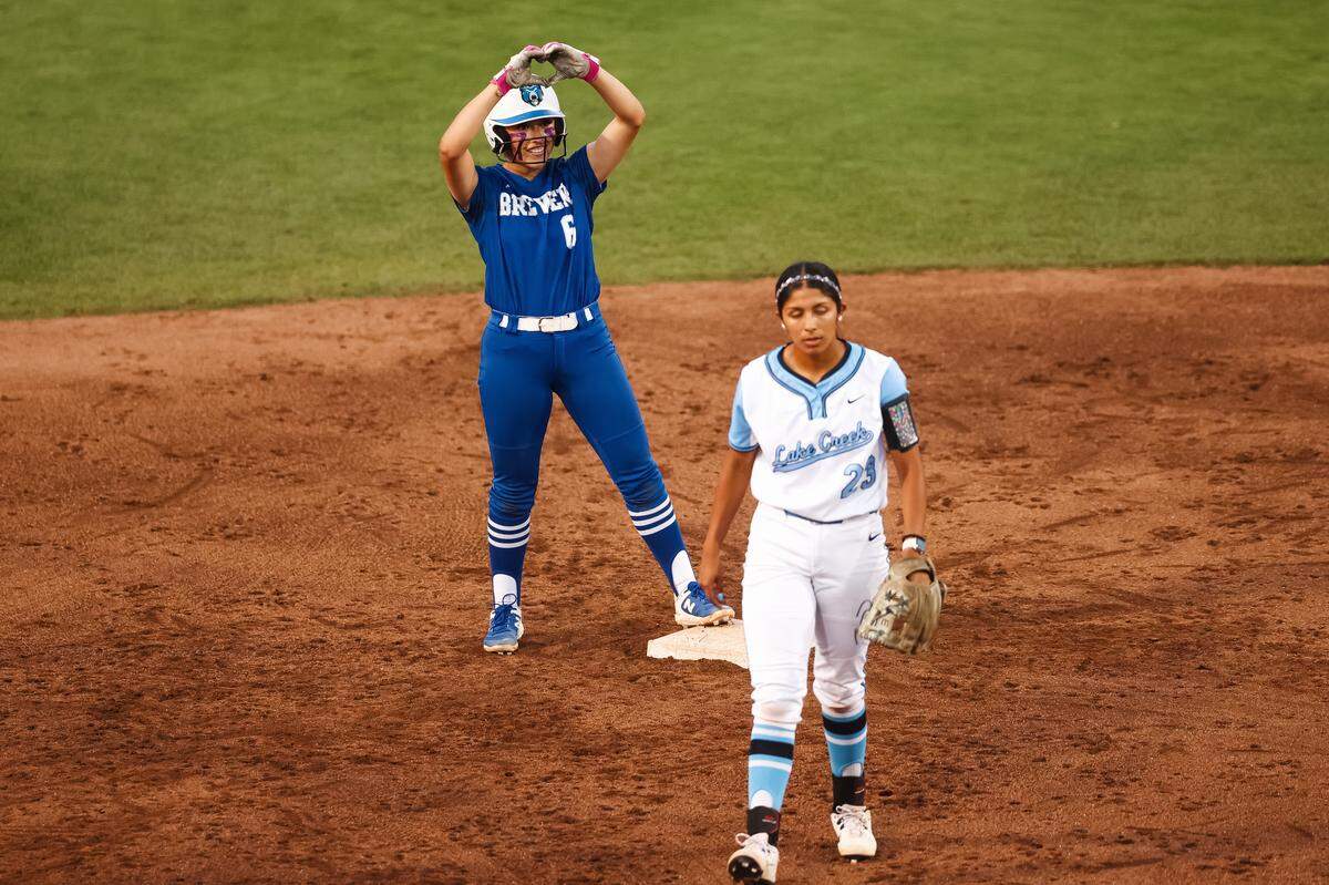 White Settlement Brewer shortstop Haylie Jimenez (6) holds her hands in the shape of a heart after reaching second base against Montgomery Lake Creek in the UIL Class 5A Division II state softball championship game at Red & Charline McCombs field in Austin, Texas, on Friday, May 29, 2026.