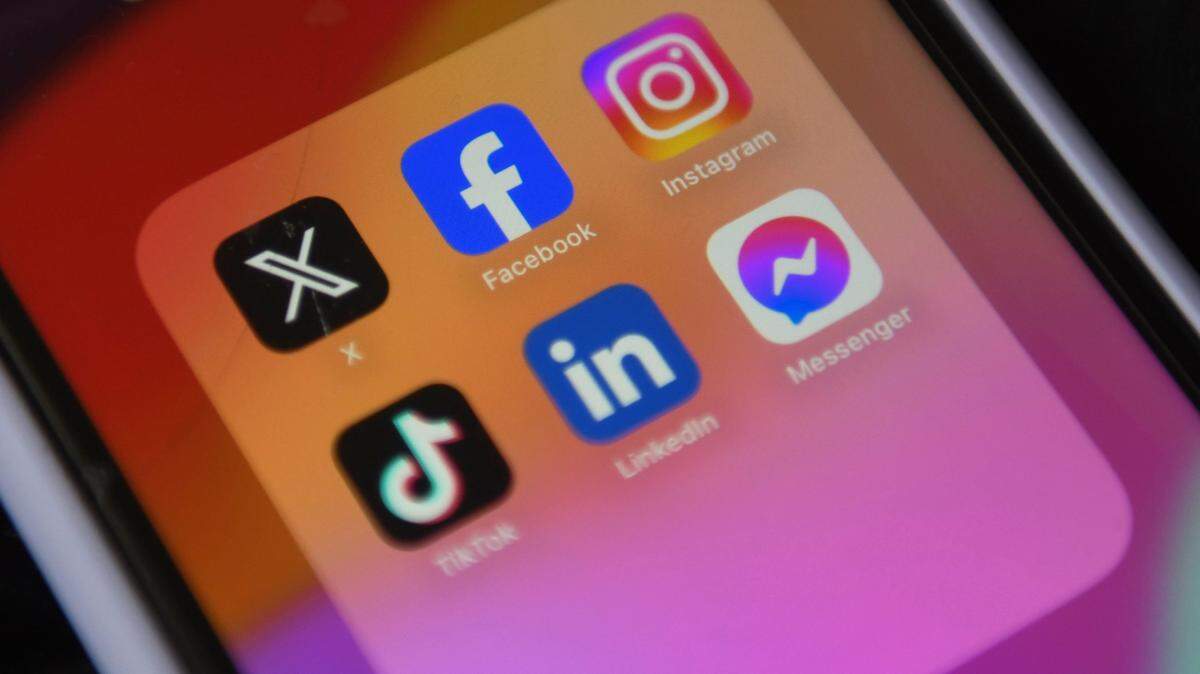 A phone screen with social media icons