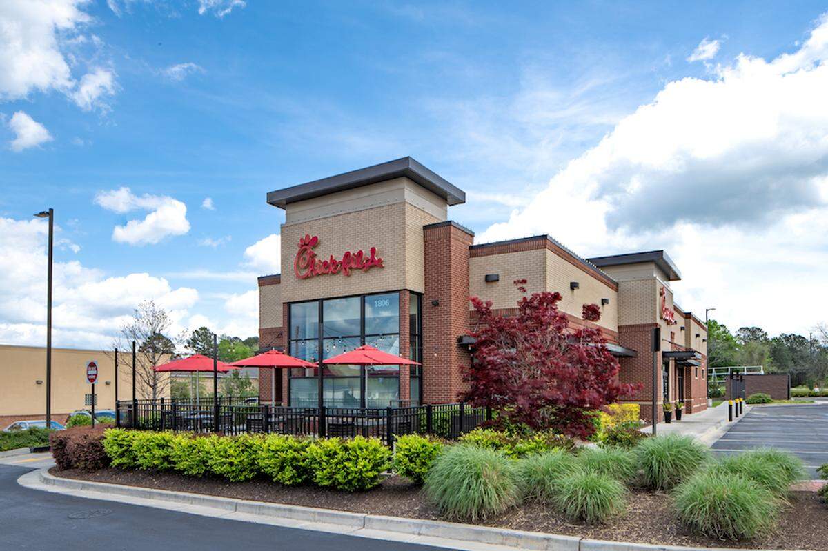 A Chick-fil-A restaurant with drive-thru.