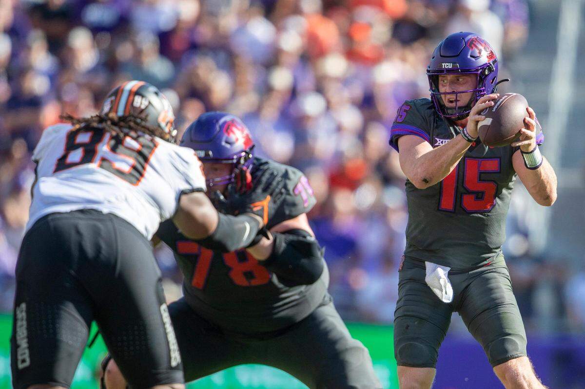 TCU quarterback Max Duggan looks to pass during their game against OSU at the Amon G. Carter Stadium in Fort Worth on Saturday, Oct. 15, 2022. The final score was 43-40.
