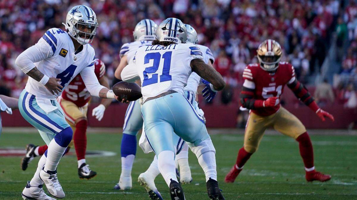 End of an era: Dallas Cowboys quarterback Dak Prescott hands off to running back Ezekiel Elliott during the Cowboys’ divisional round playoff loss to San Francisco. The two came into the league together in 2016, and it’s doubtful Zeke will be back in 2023.