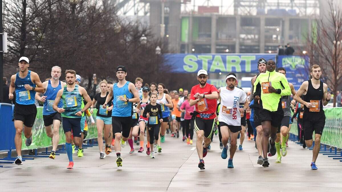 Participants in the Cowtown Adult 5K and 10K runs take off from the starting line after a weather delay forced a simultaneous start Saturday morning, February 24, 2018 at the Will Rogers Memorial Center in Fort Worth, Texas. Area thunderstorms forced a delay of the start of the Kids 5k run.