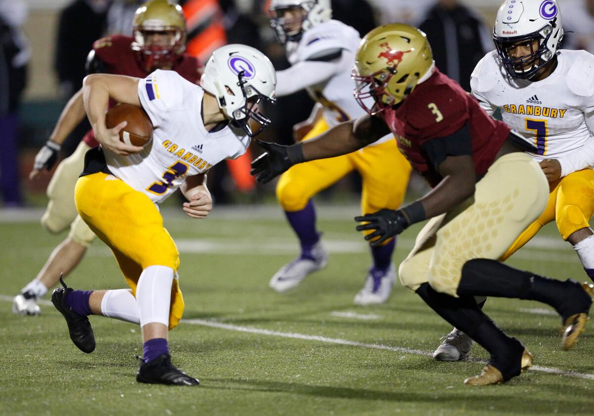 GranburyÕs Fabian Landin (3) runs in the second half, as SaginawÕs Quincy Mason (3) moves to tackle him. The Granbury Pirates played the Saginaw Rough Riders in District 3-AAAAA, division 1 high school football Friday, November 8, 2019, at Rough Rider Stadium in Saginaw, Texas.