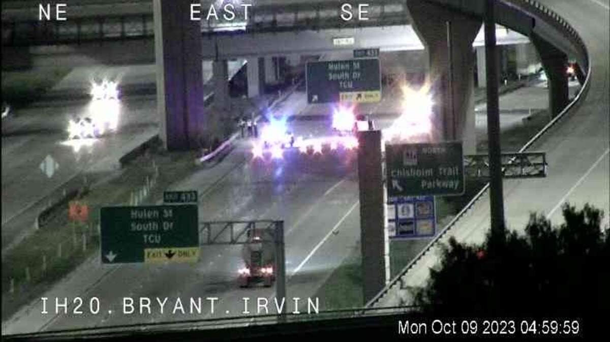 Both drivers were killed and a passenger was injured when a vehicle traveling the wrong way on Interstate 20 near Hulen Street collided head on with another vehicle early Monday morning, Oct. 9, 2023, Fort Worth police said. An image from a Texas Department of Transportation traffic camera shows the freeway closed near Bryant Irvin Road following the accident.