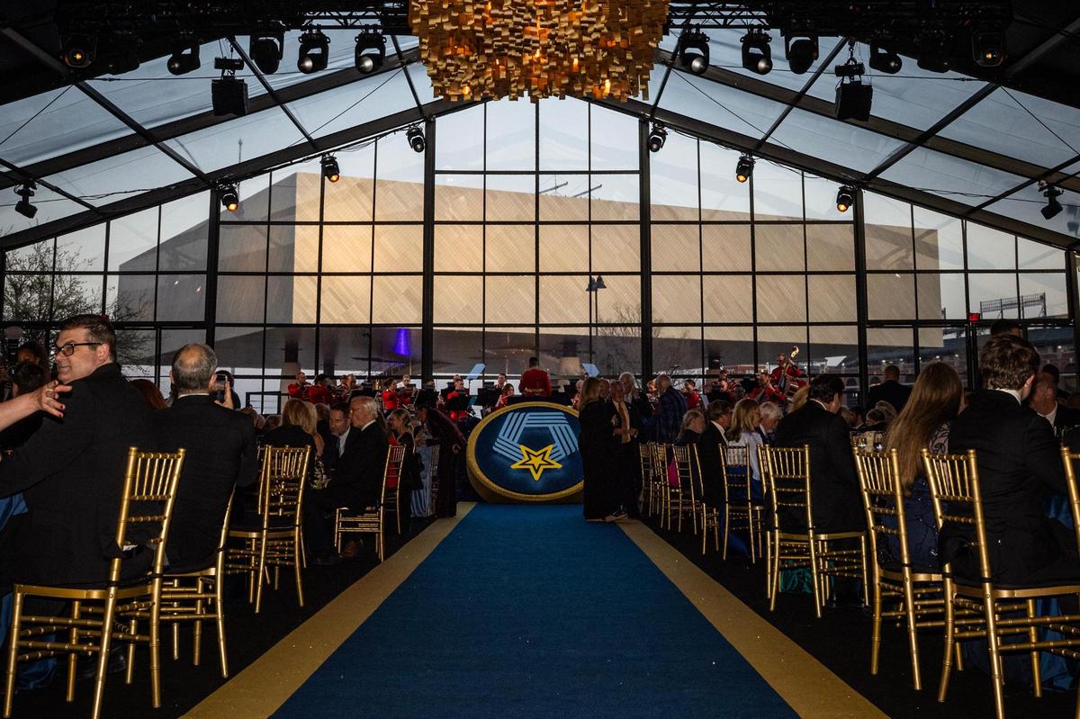 The National Medal of Honor Museum is shown through the windows of the ballroom where the dinner was held for the National Medal of Honor Museum Grand Opening Celebration in the Arlington Entertainment District on Saturday, March 22, 2025.