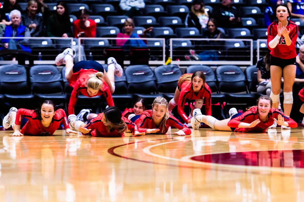 The Mustang bench celebrates during the 5A state semifinal game between Grapevine and Comal Canyon at the Curtis Culwell Center in Garland on November 19, 2021. Photo by Matt Smith. Special to the Star-Telegram.