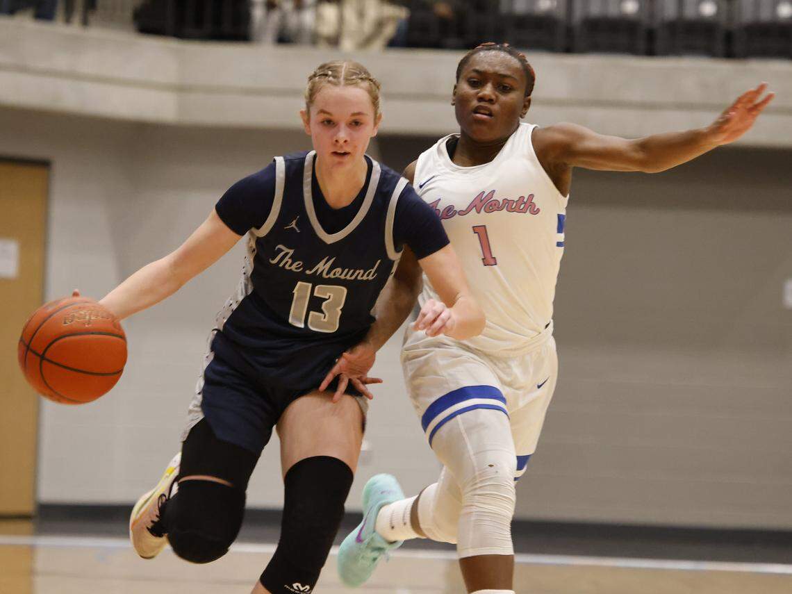 Flower Mound guard Brooklyn Gray (13) outruns North Crowley guard Jamari Milton (1) to the net during the first half of a UIL Class 6A Division I girls regional final basketball playoff game at Arlington ISD Athletics Center in Arlington, Texas, Friday Feb. 27, 2026.