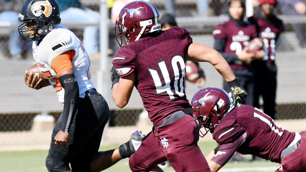 Polytechnic’s Adam Woods, left, is chased by North Side’s Freddy Serna and Isaiah Torrez as he races into the endzone to take a 13-7 lead in the second quarter during Saturday’s November 2, 2019 football game at Scarborough-Handley Field in Fort Worth, Texas. Special/Bob Haynes