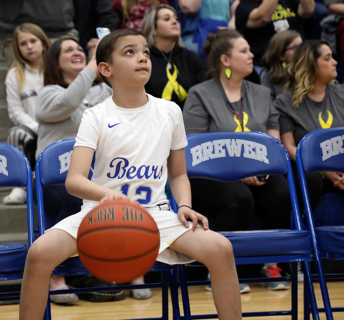 Carter Escobar, a 9-year-old boy who played in a high school basketball game last season, passed away on Friday.