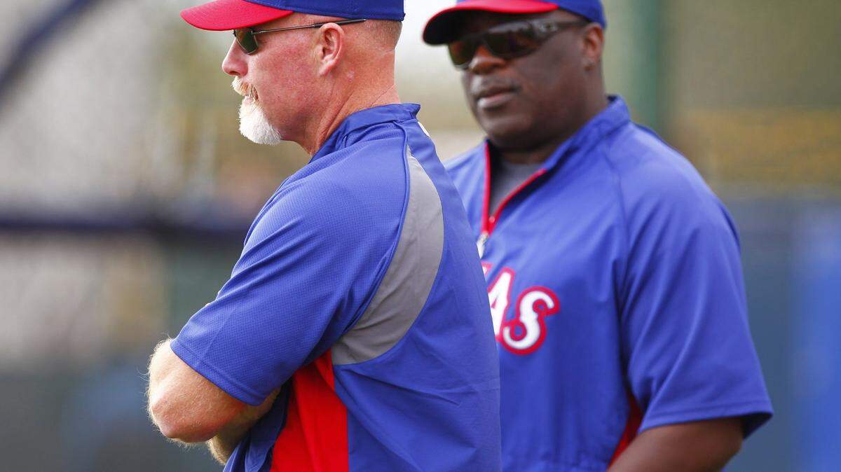 Former Texas Rangers outfielder Rusty Greer (left) is the new baseball coach at Fort Worth Christian School. 