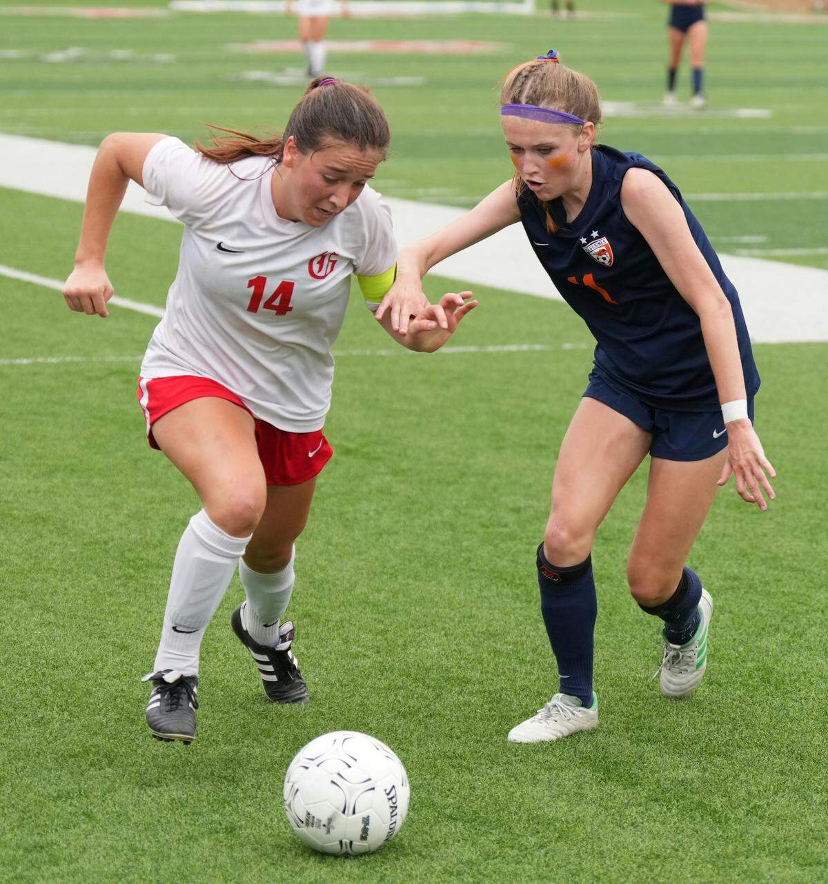 Grapevine’s Theresa McCullough goes by a Frisco Wakeland defender during the 5A title game (Ken Murphy/MaxPreps)