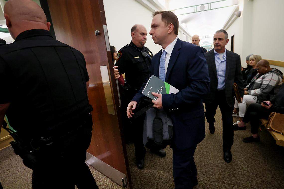 Aaron Dean arrives at Tarrant County’s 396th District Court for closing arguments in his trial on Wednesday, Dec. 14, 2022, in Fort Worth. The former police officer is accused of murder in the 2019 shooting of Atatiana Jefferson at her home.