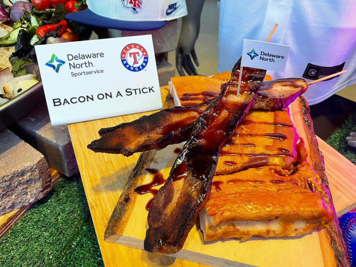 Cooked bacon is glazed with Dr. Pepper barbecue sauce.