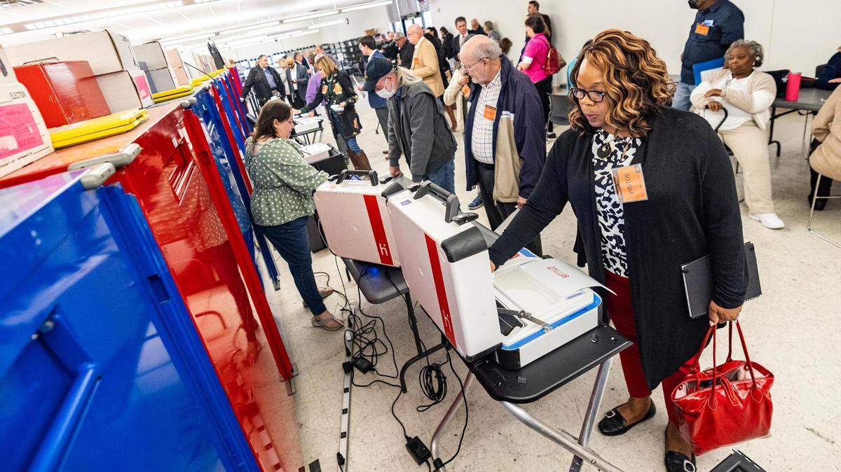 People participated in a mock election Thursday at the Tarrant County election administration office.