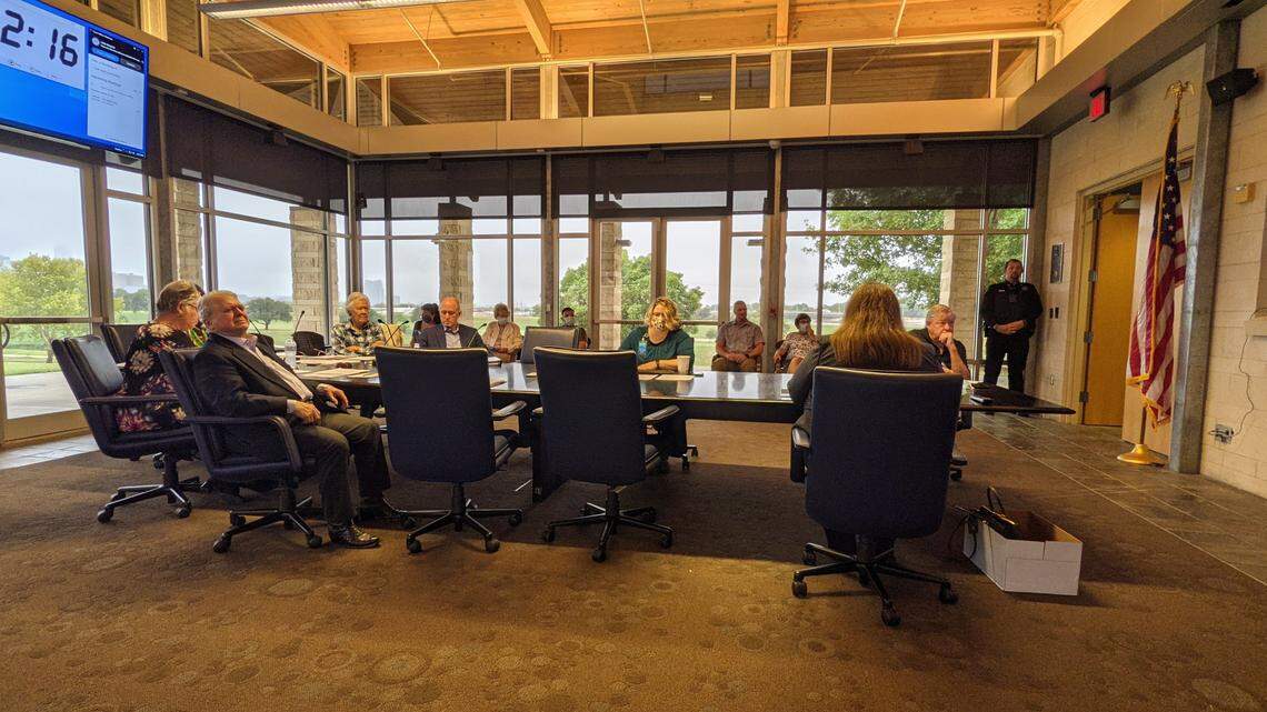 Members of the Tarrant Regional Water District Board listen to a presentation on new rules aimed at firming up policies around nepotism and member authority.