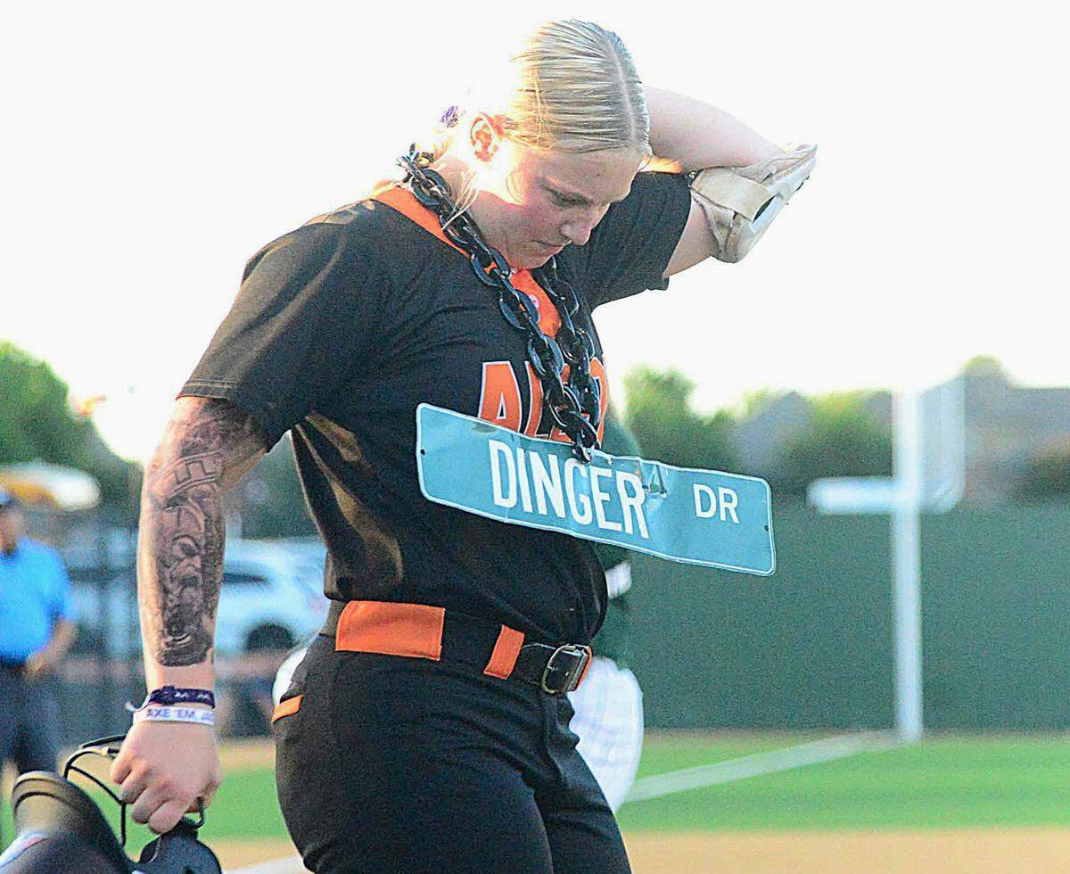 Aledo’s Delaney Rosser dons the Dinger Drive necklace after hitting a home run against North Richland Hills Birdville in a UIL Class 5A Division I bi-district softball game on Friday, April 24, 2026, at Birdville High School in North Richland Hills, Texas.