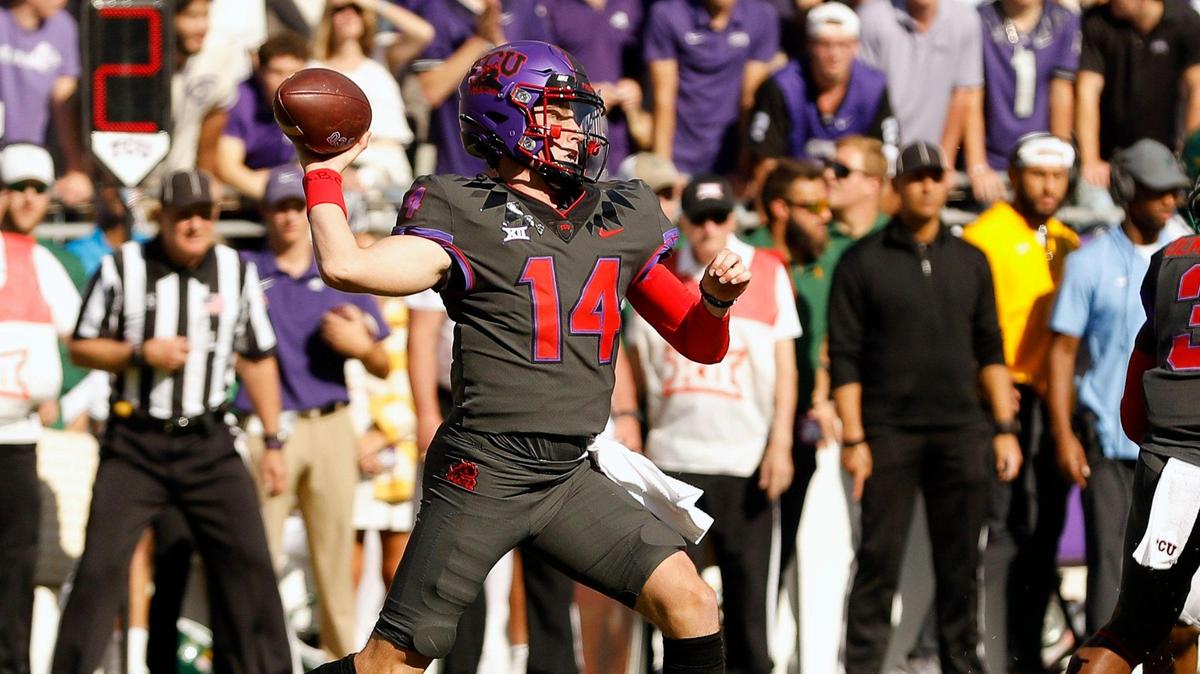 TCU quarterback Chandler Morris (14) tosses a short pass in the first half of Saturday’s Baylor game. Morris made his first college start.