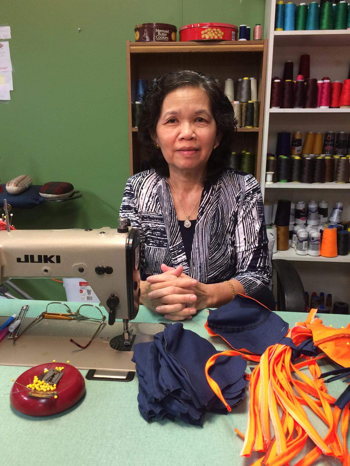 Arlington Lamar boys coach Sunny Soeun’s mother Kim Hun Nam at her tailor shop in Abilene. Hun Nam has made over 250 masks in the past months for local first responders.