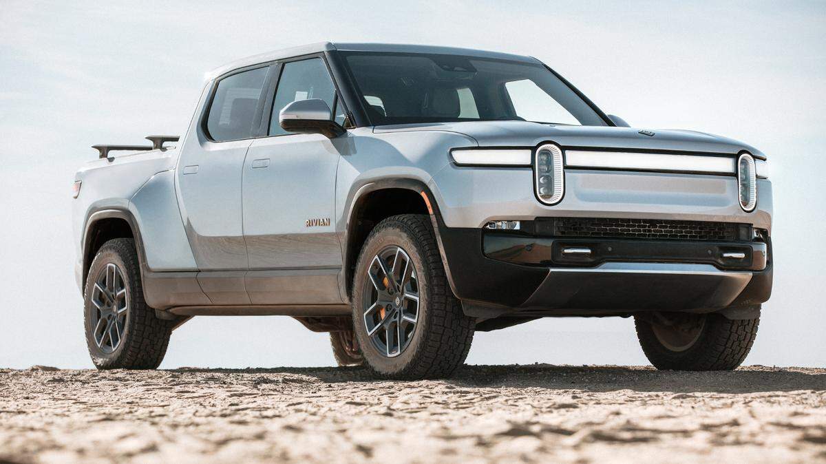The Rivian R1T pickup has a range of 300-plus miles and starts at $67,500, according to the company.